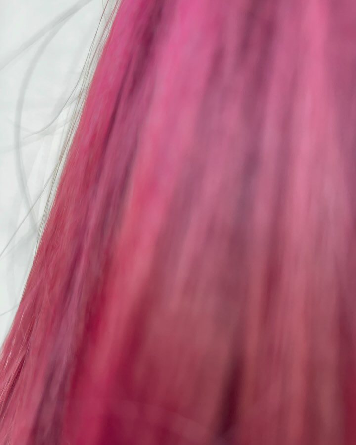 Bright cherry red hair color at Mirian May hair salon in Glendale, CA